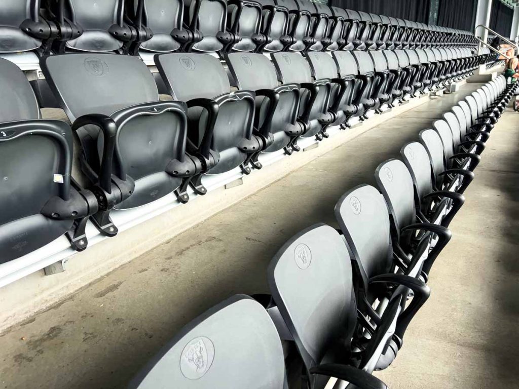 The upper level seats in Allegiant Stadium are all individual seats with a seat back.