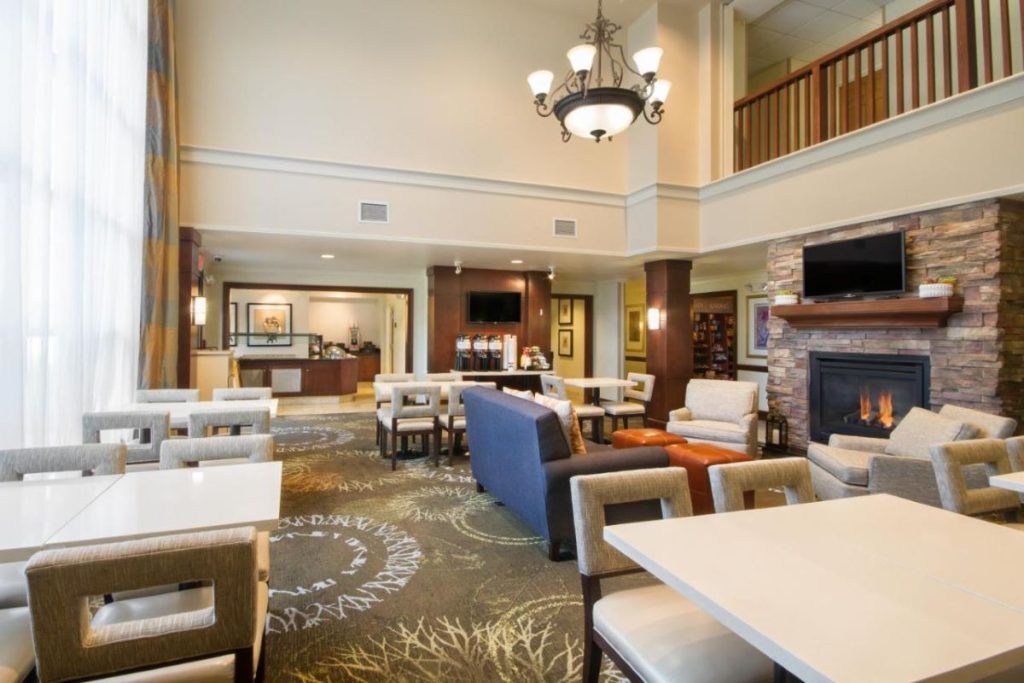 the elegant lobby of the Staybridge Suites Buffalo - one of the best hotels near the Buffalo Bills stadium.