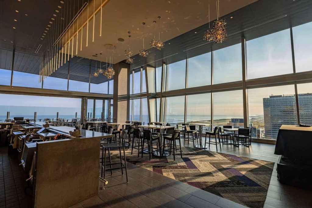 A rooftop bar at the Hilton Cleveland Downtown hotel provides great views of the Lake Erie waterfront, including Huntington Bank Field.