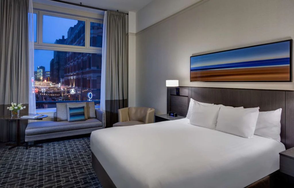 A lit up street is visible from a guest room at the Hyatt Regency Cleveland at The Arcade hotel.