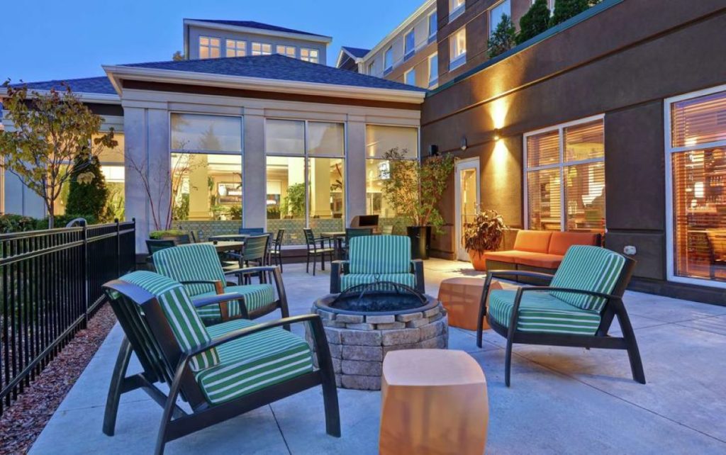 An outside seating area at the Hilton Garden Inn Green Bay - just a short walk from Lambeau Field.