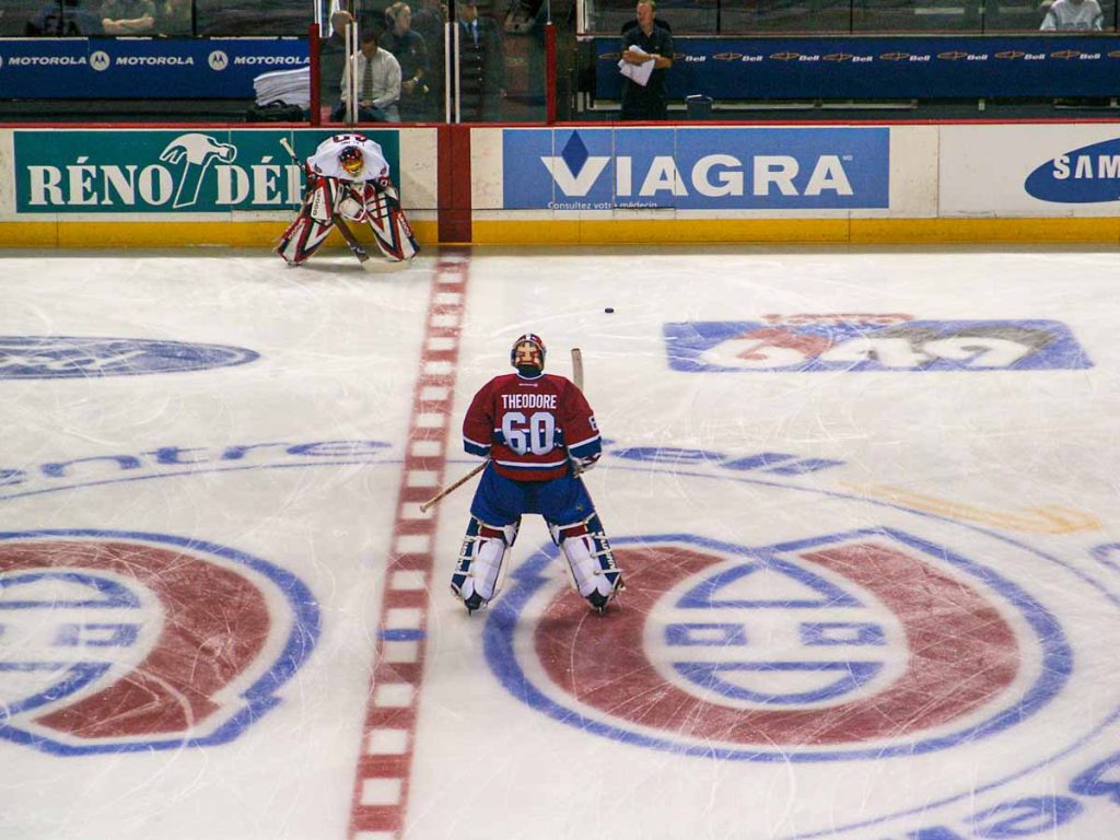 Goalies for the Montreal Canadiens and Ottawa Senators warm up before an NHL game at Bell Centre.