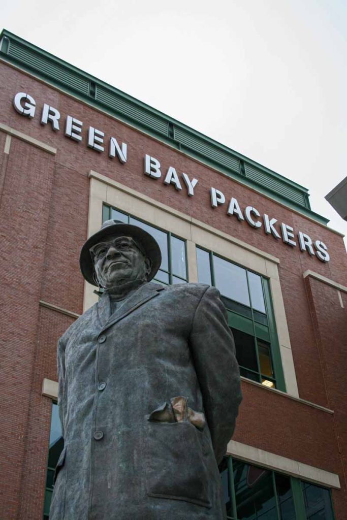 A statue of Vince Lombardi in front of Lambeau Field in Green Bay, WI.