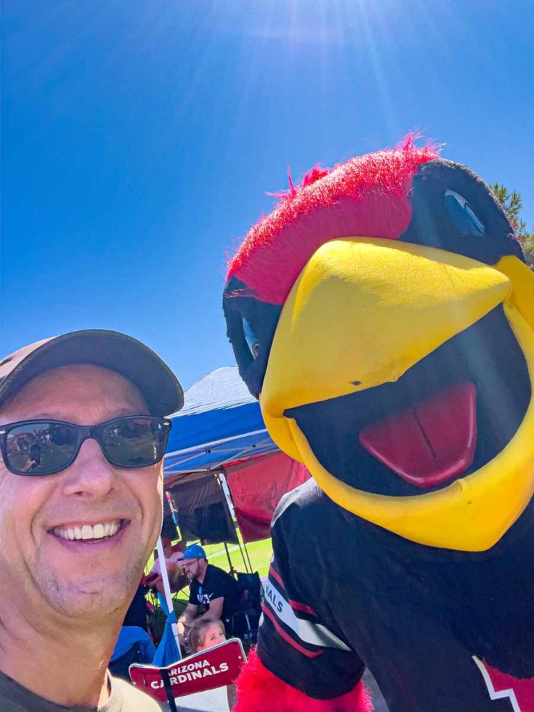 Dan Brewer and Big Red - the Arizona Cardinals mascot - before a Sunday home game.