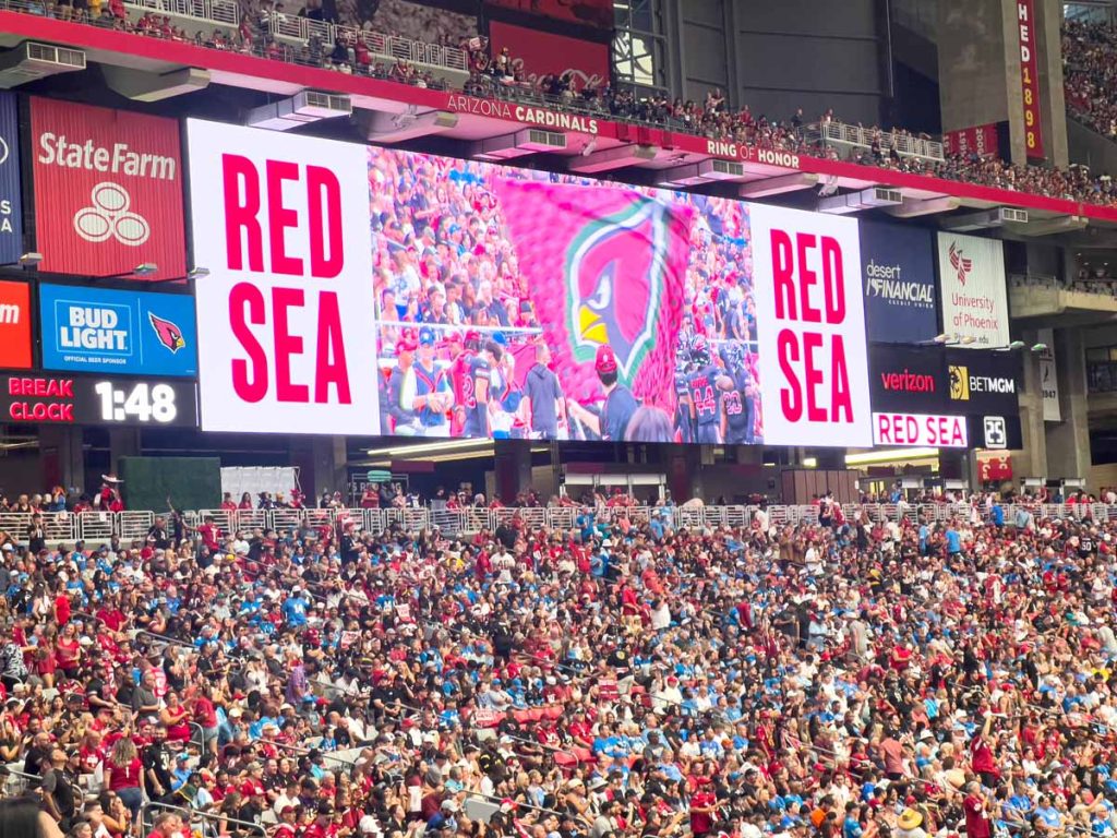 The endzone jumbotron at an Arizona Cardinals game reads, "Red Sea".