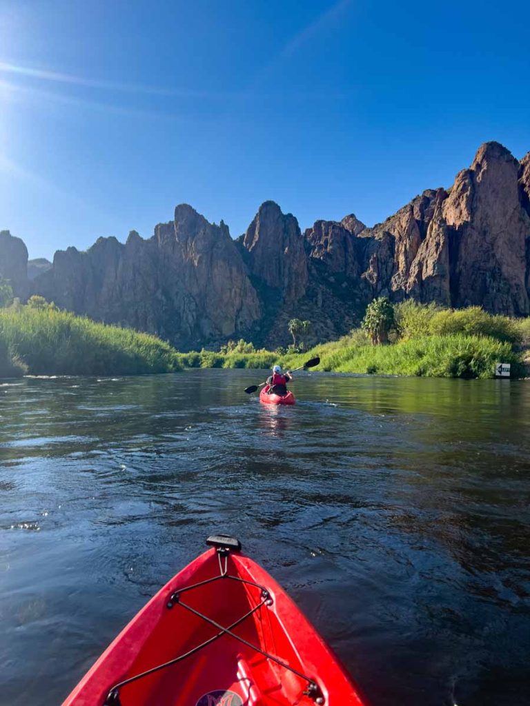 Dan Brewer, owner of UltimateSportsRoadTrip.com, kayaks down the Lower Salt River on a sports road trip to Phoenix, AZ.