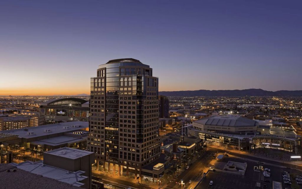 an aerial shot of the Hyatt Regency Phoenix shows the close proximity of the hotel to the Footprint Center.